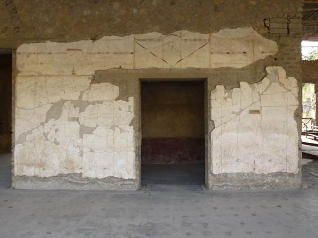 Oplontis, September 2011. Area 60, the west portico with doorway to room 75. On the right is the doorway to room 69. Photo courtesy of Michael Binns.