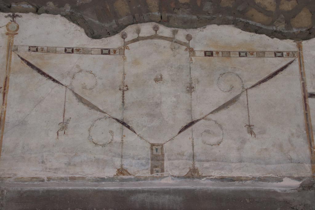 Villa of Poppaea, Oplontis, October 2023. Portico 60, painted upper west wall above doorway to room 72. Photo courtesy of Klaus Heese.