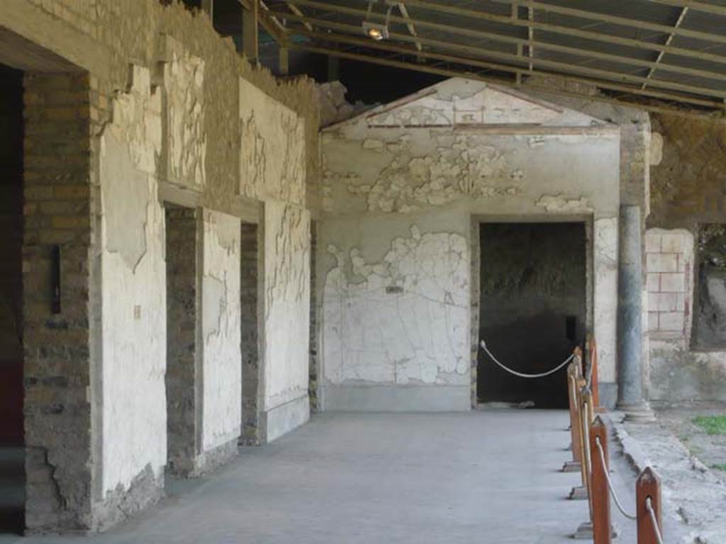 Oplontis, May 2011. Portico 60, looking north. On the left is the doorway to room 74, then 88, 90 and 94. On the right is the doorway and window to room 97. Photo courtesy of Buzz Ferebee.