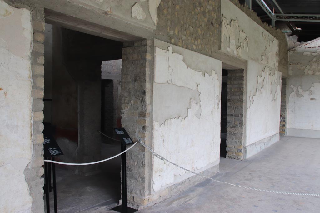Villa of Poppaea, Oplontis, October 2023.
Portico 60, looking north along west wall, with doorways to rooms 88, 90 and 94. Photo courtesy of Klaus Heese.