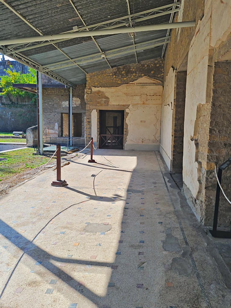 Oplontis Villa of Poppea, October 2023.
Area 60, looking along portico towards south-west corner, with doorway to room 66, centre left. Photo courtesy of Giuseppe Ciaramella.