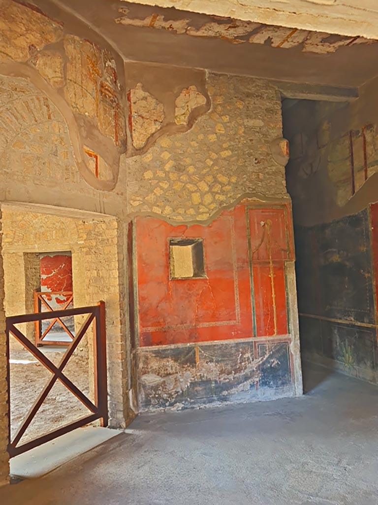 Oplontis Villa of Poppea, October 2023.
Room 66, looking towards south wall with niche, and south-west corner.
On the right is corridor 77, and the west wall. Photo courtesy of Giuseppe Ciaramella.