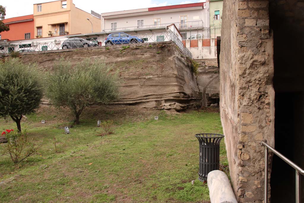 Oplontis Villa of Poppea, October 2020.
Looking north across garden area from outside doorway to room 69, on right. Photo courtesy of Klaus Heese.