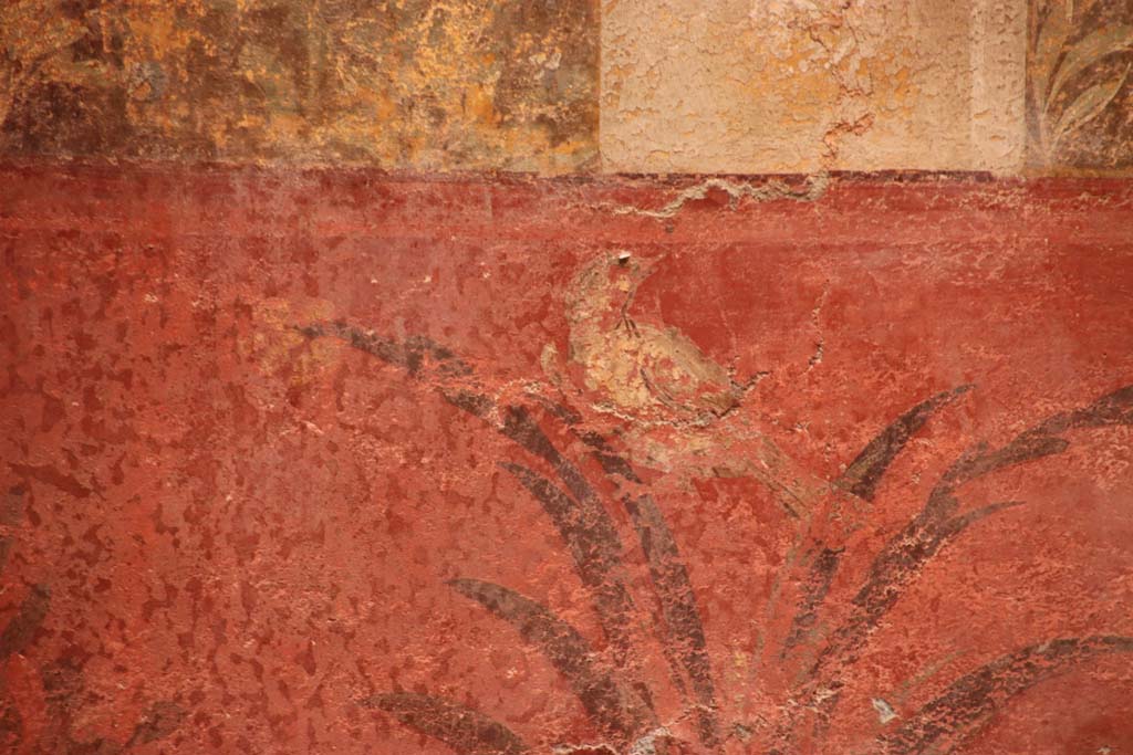 Oplontis Villa of Poppea, October 2020. Room 70, detail of bird on red zoccolo/dado beneath fountain on north wall in north-west corner.
Photo courtesy of Klaus Heese.