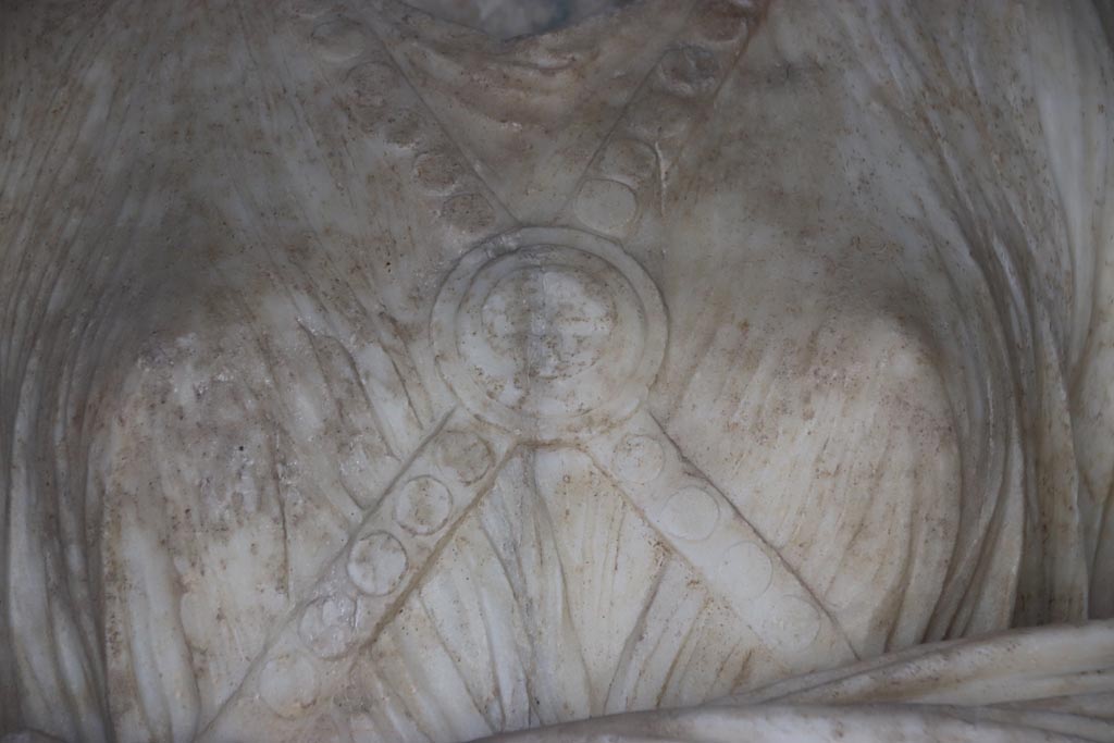 Villa of Poppaea, Oplontis, October 2023. Room 72, detail from tunic of marble statue of Nike. Photo courtesy of Klaus Heese.
