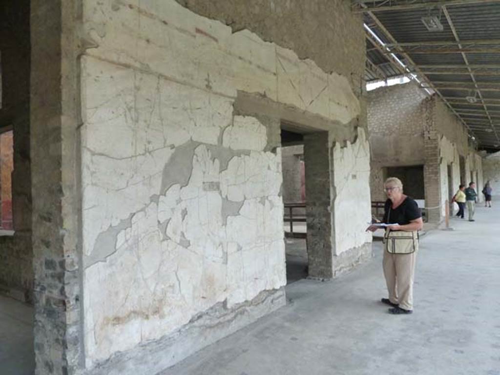 Oplontis, September 2015. Portico 60, doorway to room 65, on left, and room 75, centre right. Looking north.
