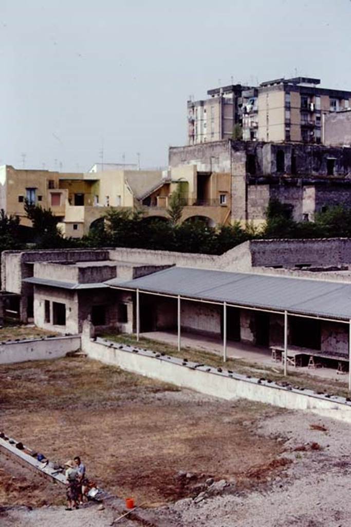 Oplontis, c.1978.Looking south-west across pool towards area 60, the portico.
On the left are the two windows of room 78. Photo by Stanley A. Jashemski.
Source: The Wilhelmina and Stanley A. Jashemski archive in the University of Maryland Library, Special Collections (See collection page) and made available under the Creative Commons Attribution-Non Commercial License v.4. See Licence and use details. Oplo0158