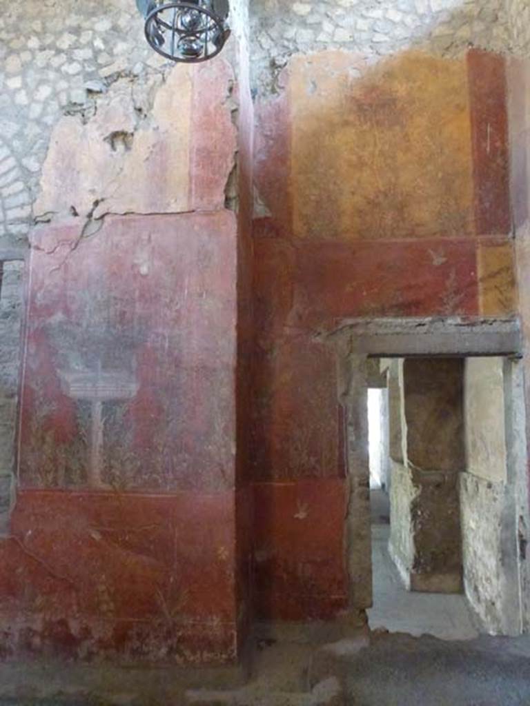 Oplontis, September 2011. Room 87, painted south wall, and doorway into room 73, at the rear of room 74. Photo courtesy of Michael Binns.