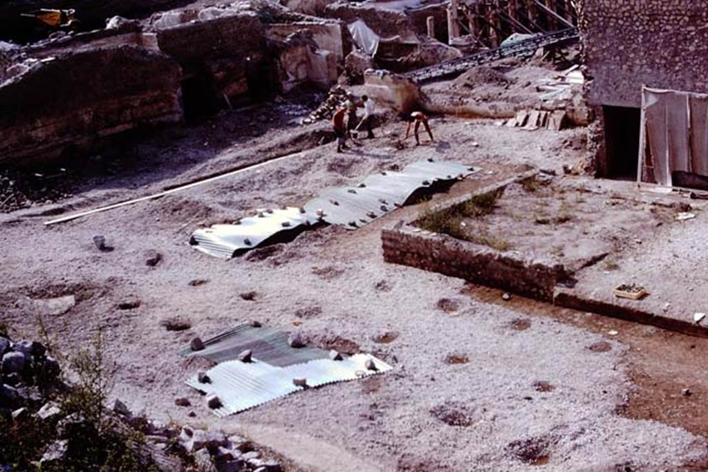 Oplontis, 1975. Looking south-east across north garden and sites of cavities, towards room 64 with two doorways. Photo by Stanley A. Jashemski.
Source: The Wilhelmina and Stanley A. Jashemski archive in the University of Maryland Library, Special Collections (See collection page) and made available under the Creative Commons Attribution-Non Commercial License v.4. See Licence and use details. J75f0109