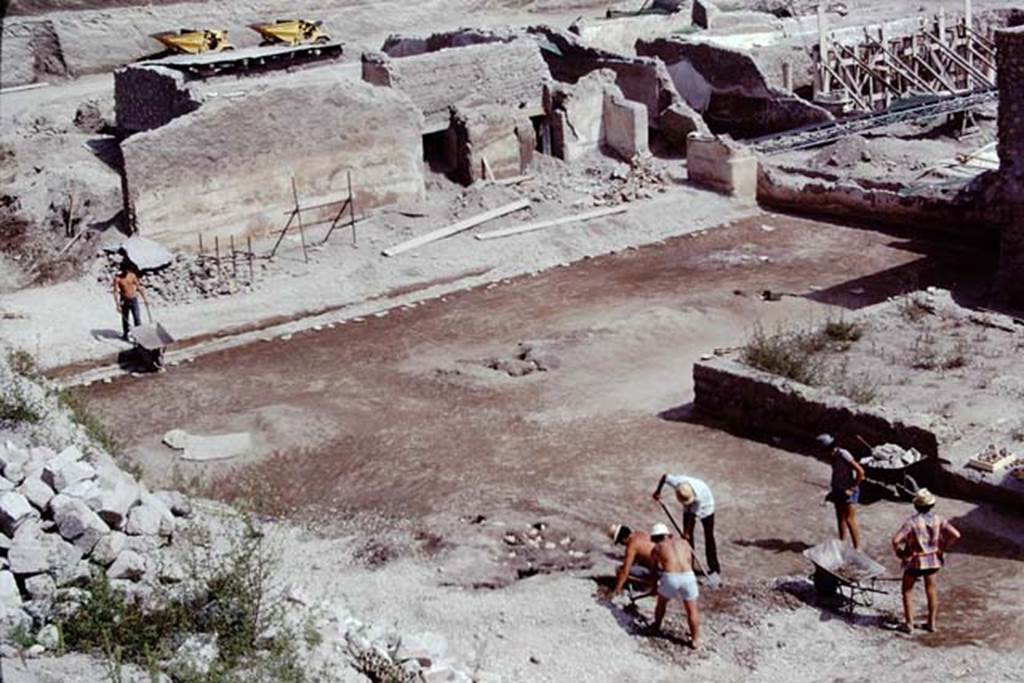 Oplontis, 1975. Looking south-east across east end of north garden, towards doorway of room 69, on left, and two doorways into room 64. Photo by Stanley A. Jashemski.
Source: The Wilhelmina and Stanley A. Jashemski archive in the University of Maryland Library, Special Collections (See collection page) and made available under the Creative Commons Attribution-Non Commercial License v.4. See Licence and use details. J75f0170