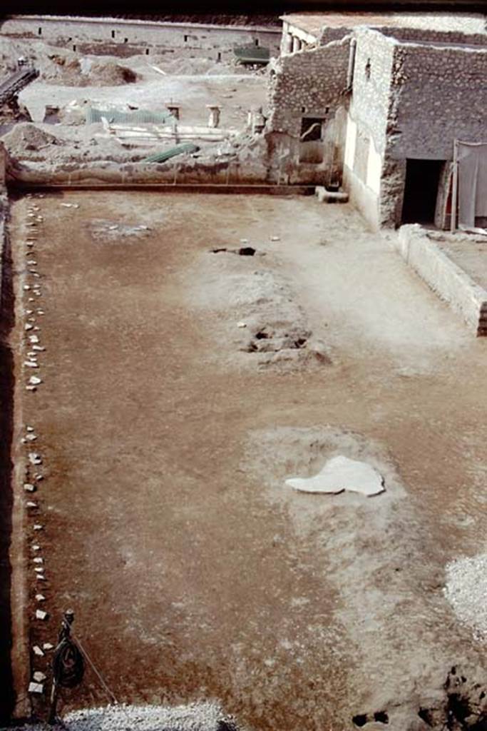 Oplontis, 1975. Looking south at east end of cleaned north garden, across line of root-cavities of 4 trees, and many smaller root cavities along the east side.
Photo by Stanley A. Jashemski.
Source: The Wilhelmina and Stanley A. Jashemski archive in the University of Maryland Library, Special Collections (See collection page) and made available under the Creative Commons Attribution-Non Commercial License v.4. See Licence and use details. J75f0202