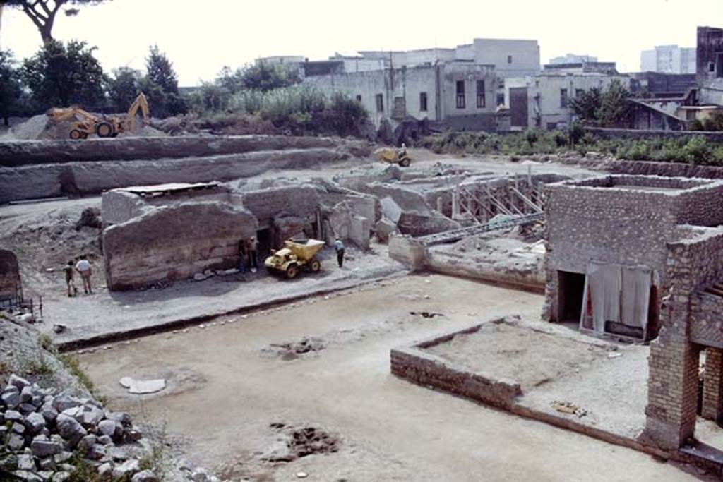 Oplontis, 1975. Looking south-east across cleaned east end of north garden, and towards doorway to room 69, on left, and east peristyle, centre right.
Photo by Stanley A. Jashemski.
Source: The Wilhelmina and Stanley A. Jashemski archive in the University of Maryland Library, Special Collections (See collection page) and made available under the Creative Commons Attribution-Non Commercial License v.4. See Licence and use details. J75f0222