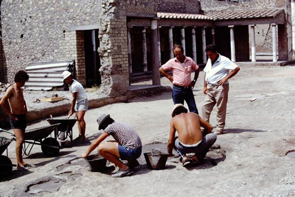 Oplontis, 1975. Finishing touches to the cement. Photo by Stanley A. Jashemski.
Source: The Wilhelmina and Stanley A. Jashemski archive in the University of Maryland Library, Special Collections (See collection page) and made available under the Creative Commons Attribution-Non Commercial License v.4. See Licence and use details. J75f0319