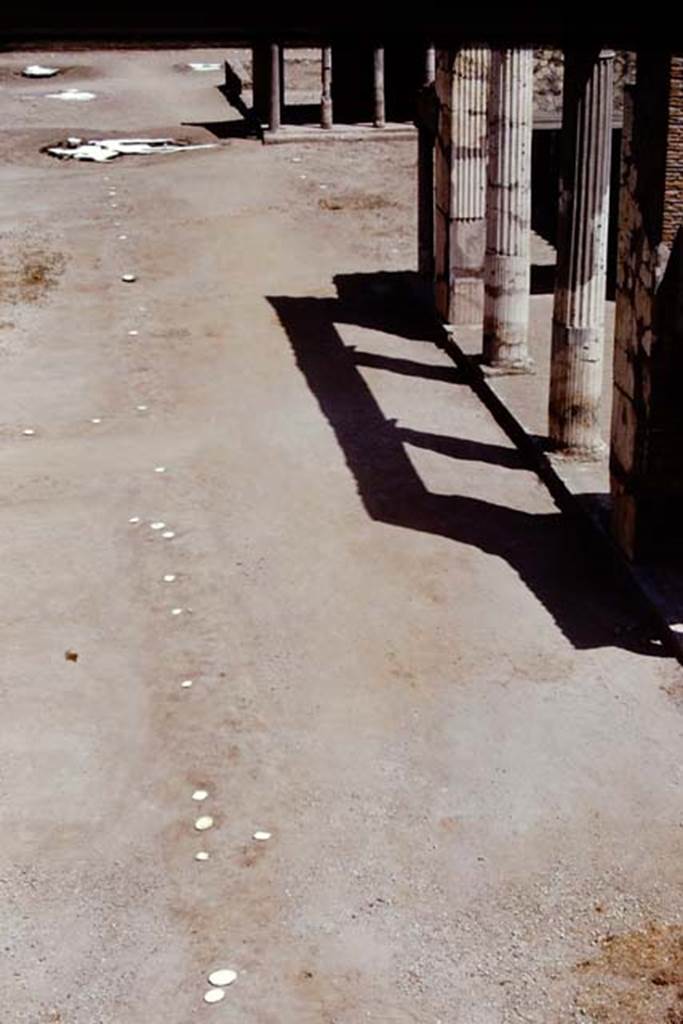 Oplontis Villa of Poppea, c.1977. Looking east across north garden, along west-east pathway at the rear of the villa.
On the right is the large entrance to room 21.
Source: The Wilhelmina and Stanley A. Jashemski archive in the University of Maryland Library, Special Collections (See collection page) and made available under the Creative Commons Attribution-Non Commercial License v.4. See Licence and use details.
Oplo0083