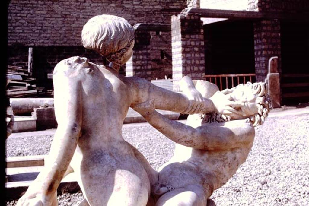 Oplontis Villa of Poppea, 1978. Detail from marble statue of hermaphrodite and faun.
Photo by Stanley A. Jashemski.
Source: The Wilhelmina and Stanley A. Jashemski archive in the University of Maryland Library, Special Collections (See collection page) and made available under the Creative Commons Attribution-Non Commercial License v.4. See Licence and use details.
J78f0053
SAP inventory number 72800.