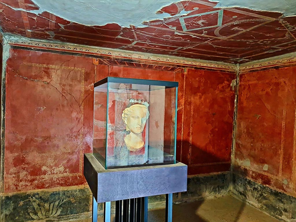 Oplontis Villa of Poppea, October 2023. Room 38, looking towards north wall. Photo courtesy of Giuseppe Ciaramella.
The white marble head of the goddess Aphrodite on display here in Room 38, was found in the North garden 56.