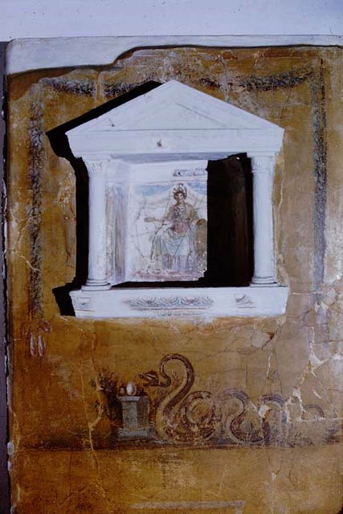 Gragnano, Villa rustica in Località Carmiano, Villa A. 1968.
From dividing pilaster between kitchen room 4 and room 2.
Lararium in stucco found inserted in a yellow painted wall.
Photo by Stanley A. Jashemski.
Source: The Wilhelmina and Stanley A. Jashemski archive in the University of Maryland Library, Special Collections (See collection page) and made available under the Creative Commons Attribution-Non Commercial License v.4. See Licence and use details.
J68f1875