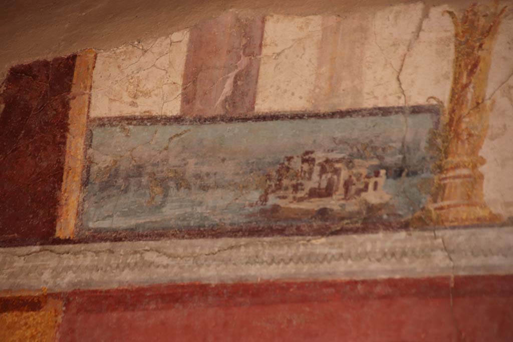 Stabiae, Villa Arianna, October 2020.
Room 7, detail of painted panel on upper wall at south end of west wall. Photo courtesy of Klaus Heese.