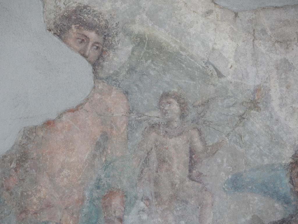 Stabiae, Villa Arianna, June 2019. Room 3, detail from painting on south wall, showing the face of Dionysus.
Photo courtesy of Buzz Ferebee.