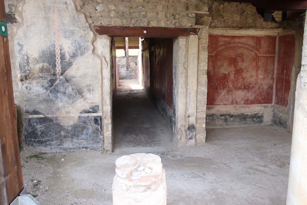 Stabiae, Villa Arianna, September 2021.
W. 22, west portico of peristyle, looking west towards remains of painted decoration at sides of doorway to corridor W.27.
Photo courtesy of Klaus Heese.