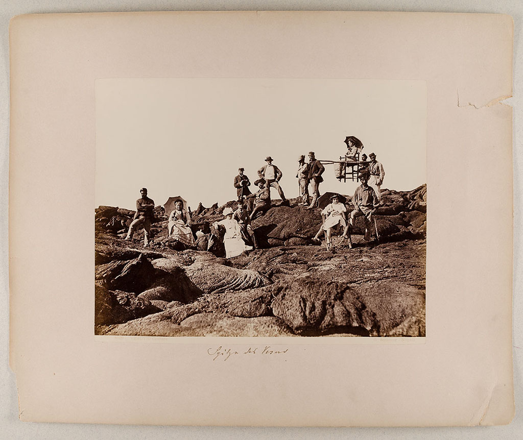 Vesuvius, about 1880. A family and their guides on the lava.
Photo title at bottom is “8129 Vesuvio - Cratere. G. Sommer – Napoli”.
The handwritten note says “Spitze des Vesuv”.
Museum für Kunst und Gewerbe Hamburg, inventory number P1981.398 (Public Domain).
See https://sammlungonline.mkg-hamburg.de/de/object/8129-Vesuvio---Cratere/P1981.398/mkg-e00135740